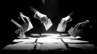 black and white close-up film noir photograph, multiple hands from different directions placing documents onto a single