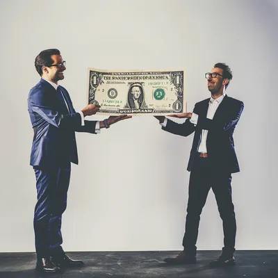 Create an image with a man in a suit giving another business person a giant novelty check.