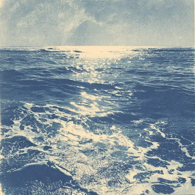 Expansive halftone ocean with heavy dithered texture, shimmering cream highlights across deep blue waves, abstract refle