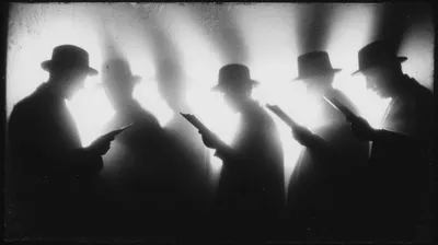 black and white film noir photograph, dramatic shadows of multiple people cast on a white wall, each shadow figure holdi