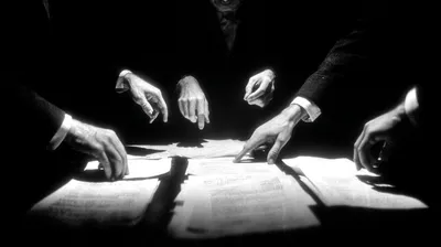 black and white close-up film noir photograph, multiple hands from different directions placing documents onto a single