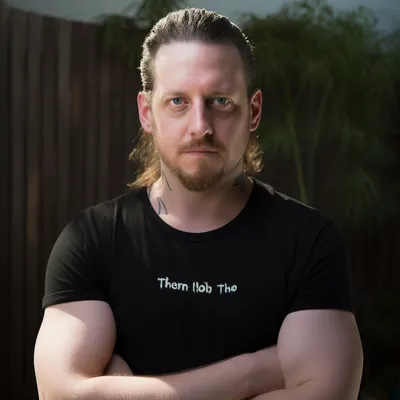 https://s.mj.run/PVmC_xiAbvc, professional wrestler, photo realistic, portrait, 50mm lens, dramatic lighting --upbeta --